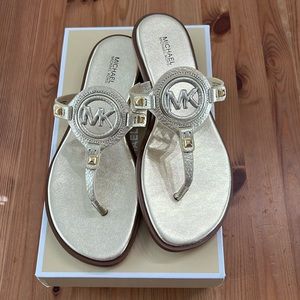 NWT size 8 Michael Kors Aubrey gold metallic cut out sandals. New in box!